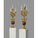 A PAIR OF FRENCH ORMOLU AND SEVRES PORCELAIN VASES AFTER THE MODEL BY PIERRE GOUTHIERE, SECOND