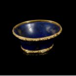 A LAPIS LAZULI AND GOLD MOUNTED OVAL BOWL 18TH /19TH CENTURY the rim and foot chased with 'C'