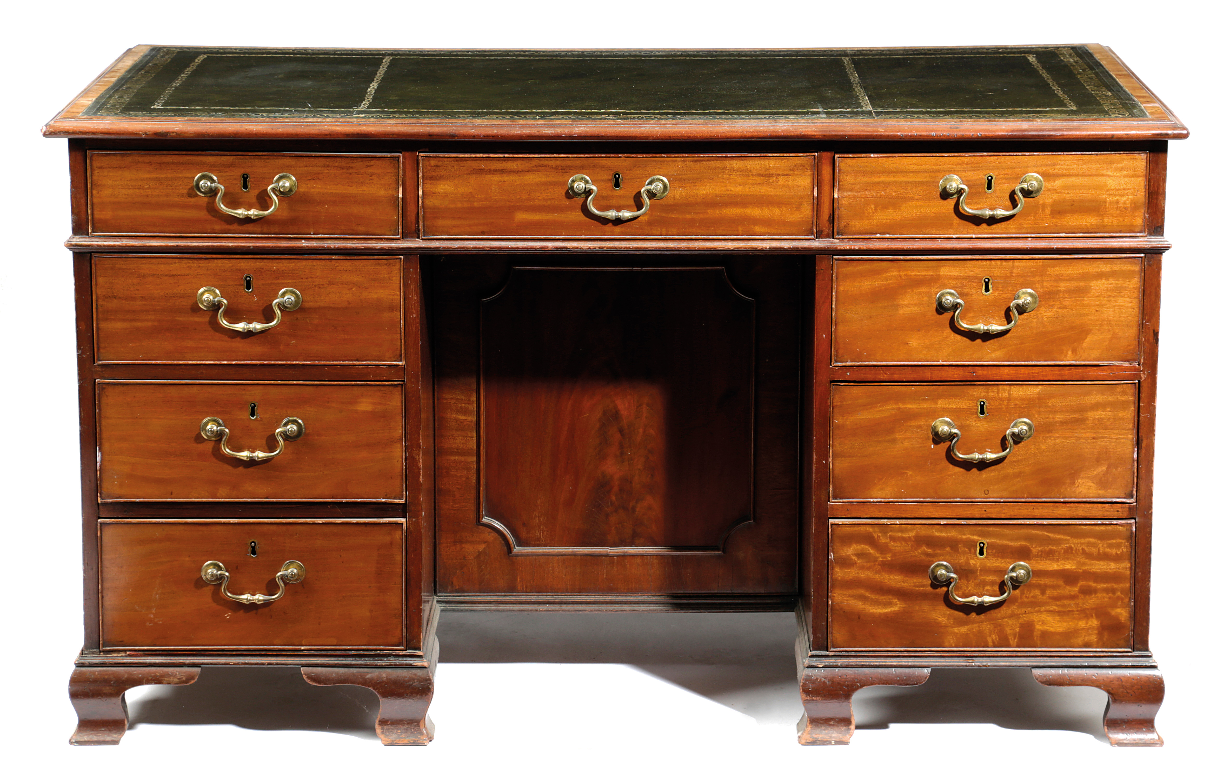 A MAHOGANY KNEEHOLE DESK IN GEORGE III STYLE, 18TH CENTURY ELEMENTS BUT LATER ADAPTED the moulded