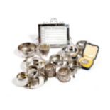 A MIXED LOT OF SILVER ITEMS of various dates and makers, comprising: a pair of salt cellars,