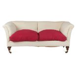 AN EDWARDIAN WALNUT SOFA BY HOWARD & SONS, EARLY 20TH CENTURY with siege de duvet upholstery, on