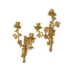 A RARE PAIR OF FRENCH ORMOLU TWIN-LIGHT WALL APPLIQUES IN LOUIS XV STYLE, SECOND QUARTER 19TH