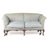AN EDWARDIAN MAHOGANY SOFA BY HOWARD & SONS, IN GEORGE II STYLE, EARLY 20TH CENTURY with scroll