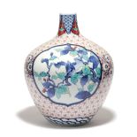 A JAPANESE PORCELAIN KAKIEMON STYLE VASE 20TH CENTURY of ovoid form with a slender neck, decorated
