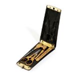 A FRENCH FIVE-PIECE TWO COLOUR GOLD SEWING ETUI LATE 19TH CENTURY with chased foliate decoration, in