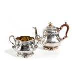 λ A VICTORIAN SILVER TEAPOT AND SUGAR BOWL 19TH CENTURY the teapot by John Beresford, London 1878,