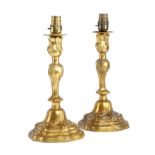 A PAIR OF GILT METAL CANDLESTICK TABLE LAMPS IN LOUIS XV STYLE LATE 19TH CENTURY the foliate nozzles