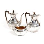 AN EDWARDIAN SILVER COFFEE POT, HOT WATER POT AND SUGAR BOWL BY HENRY ATKIN, SHEFFIELD, 1901 /