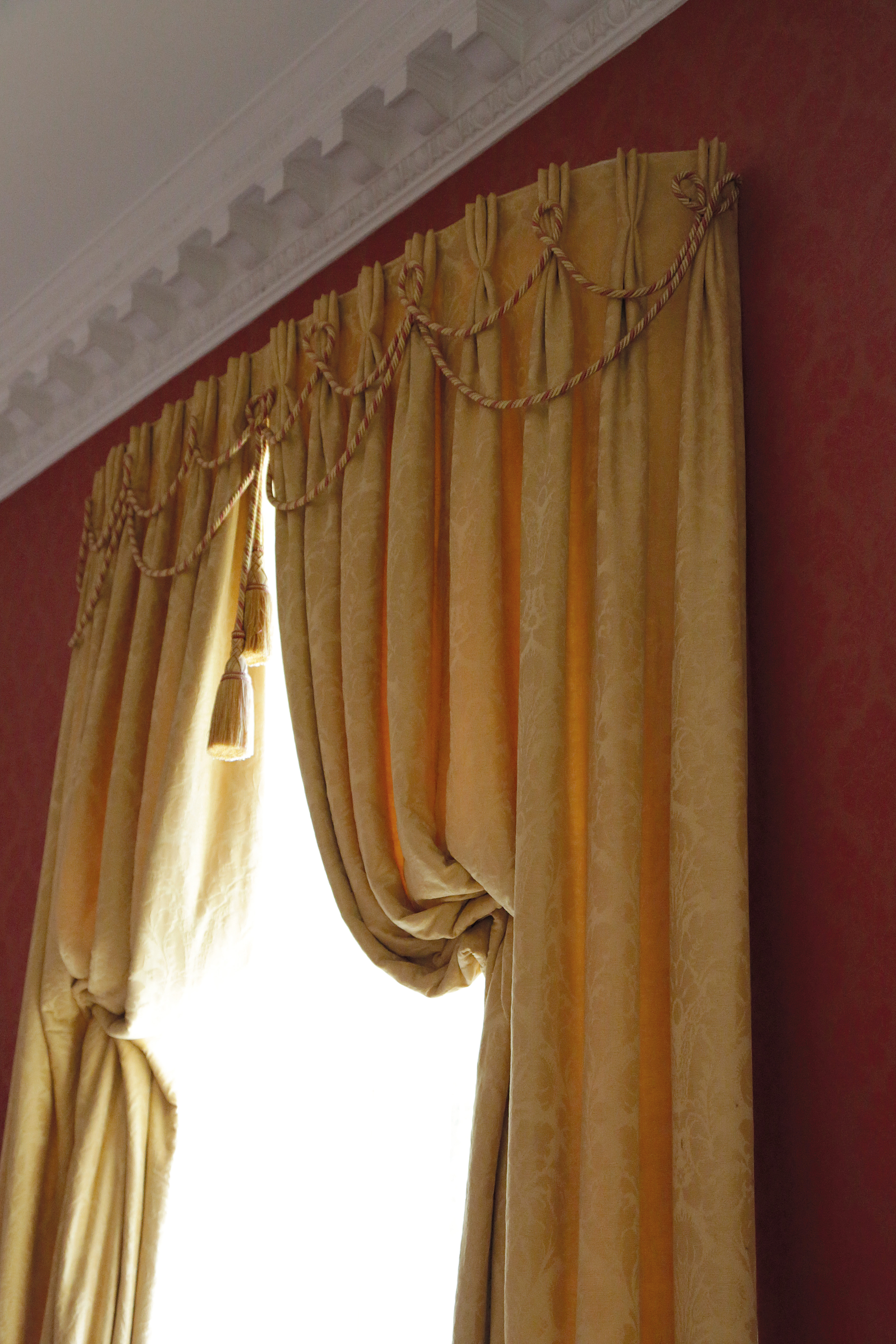 THREE PAIRS OF YELLOW SILK DAMASK CURTAINS LATE 20TH CENTURY each interlined, with rope twist