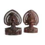 TWO INDONESIAN HARDWOOD BUSTS KLUNGKUNG, BALI, 20TH CENTURY each with an elaborate foliate and a