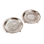 A PAIR OF GEORGE III SILVER SALVERS BY WILLIAM BURWASH, LONDON, 1815 of circular form, fluted and