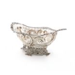 A late-Victorian silver basket, by William Comyns, London 1891, oval form, pierced and embossed with