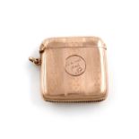 An Edwardian 9 carat gold vesta case, by Smith & Bartlam, Birmingham 1922, rectangular form, with