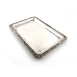 A South American metalware platter, marked Florentina, Bogota, rectangular form, chased foliate