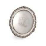 A George III silver waiter, by Emick Romer, London 1766, circular form, with a cast and pierced