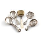 A small collection of five antique silver caddy spoons, various dates and makers, comprising: a