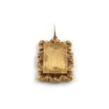 A Victorian gold vinaigrette, unmarked, rectangular form, engine-turned decoration, pierced and