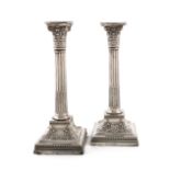 A pair of late-Victorian silver candlesticks, by James Dixon and Sons, Sheffield 1899/1900,