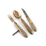 A three-piece Russia silver-gilt travelling knife, fork and spoon set, 1908-1917, plain tapering