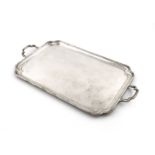 A silver two-handled tray, by Thomas Bradbury & Sons, London 1912, rectangular form, incurved