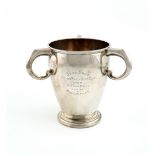 A silver three-handled cup, by the Hardy Brothers, London 1927, circular tapering from, scroll