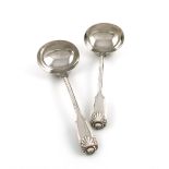 A pair of Victorian silver Fiddle, Thread and Shell pattern sauce ladles, by William Eaton, London