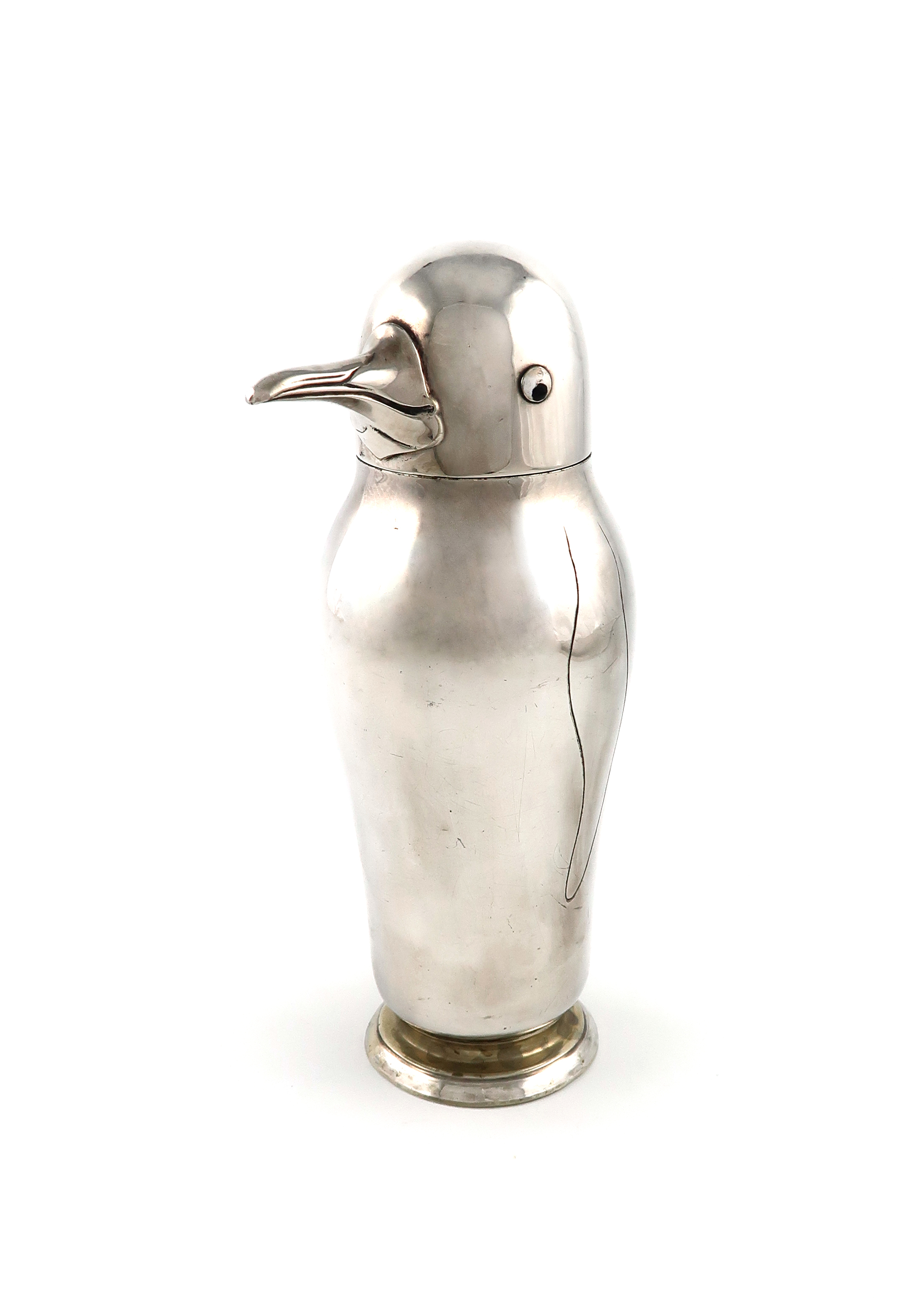 An Art Deco electroplated novelty cocktail shaker, by The Adie Brothers, modelled as a penguin,