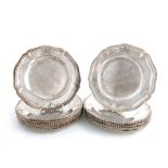 A set of eighteen Victorian silver dinner plates, by The Barnards, London 1844, shaped circular
