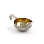 A Russian silver kovsch, maker's mark PJL. 1908-1917, circular form, gilded bowl, side handle,