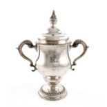 A George III silver two-handled cup and cover, by Sebastian & James Crespell, London 1764, the cover