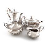 λAn Edwardian silver four-piece tea set, by James Dixon & Sons Ltd, Sheffield 1904, circular bellied