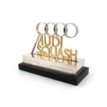 Designed by Alex Styles for Garrard, a modern parcel-gilt Audi squash trophy, London 1981, also