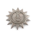 A Victorian silver Masonic badge, by John Cuisset, London 1846, fourteen pointed star, engraved