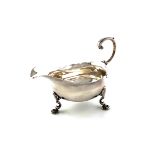 A George II silver cream boat, maker's mark partially worn, W.?, London 1756, oval form, wavy-edge