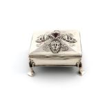 By Omar Ramsden & Alwyn Carr, a silver Arts & Crafts dressing table box, London 1909, also