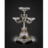 A Victorian silver epergne on a mirrored plateau, by Horace Woodward & Co., Birmingham 1878, the