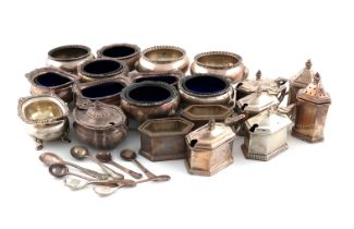 A mixed lot of silver condiments, various dates and makers, comprising: a set of four salt