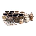 A mixed lot of silver condiments, various dates and makers, comprising: a set of four salt