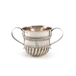 A Queen Anne silver two-handled porringer, by Charles Overing, London 1702, circular form, reeded