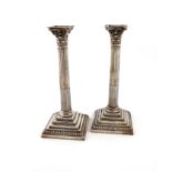 A pair of silver candlesticks, by the Harrison Brothers, Sheffield 1918, Corinthian column form,
