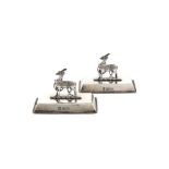 A pair of Regimental silver menu card holders, The Royal Warwickshire Regiment, by Latham and