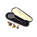 A small mixed lot, comprising: a 9 carat gold and citrine fob seal, the revolving matrix with