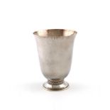 By H.G. Murphy, a silver beaker, London 1928, also marked with the Falcon mark, tapering circular