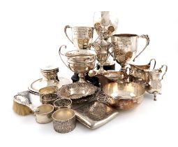 A mixed lot of silver items, various dates and makers, comprising: a capstan inkwell, five trophy