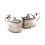 Two similar George III silver mustard pots, by Peter, Ann and William Bateman, London 1800 and 1803,