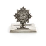 A late-Victorian Regimental silver menu card holder, by Spurrier & Co., Birmingham 1892, modelled as