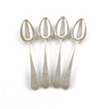 A set of four George III Irish provincial silver Old English pattern dessert spoons, by John