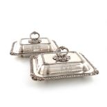 A pair of George IV silver entrée dishes and covers, by Benjamin Smith, London 1824, rectangular