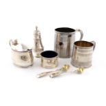 A mixed lot of silver items, various makers and dates, comprising: a George III mug, London 1812,