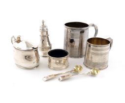 A mixed lot of silver items, various makers and dates, comprising: a George III mug, London 1812,